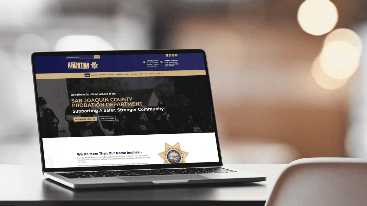 Laptop on a desk displaying the San Joaquin County Probation Department's website